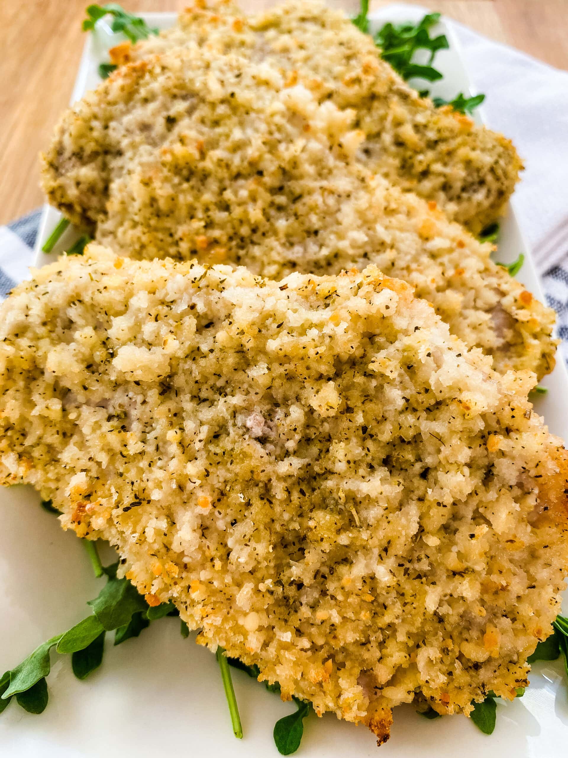 Plate with Parmesan Crusted Pork Chops. Cooking With Fudge